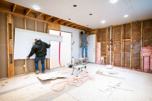 Experienced general contractor overseeing residential construction project