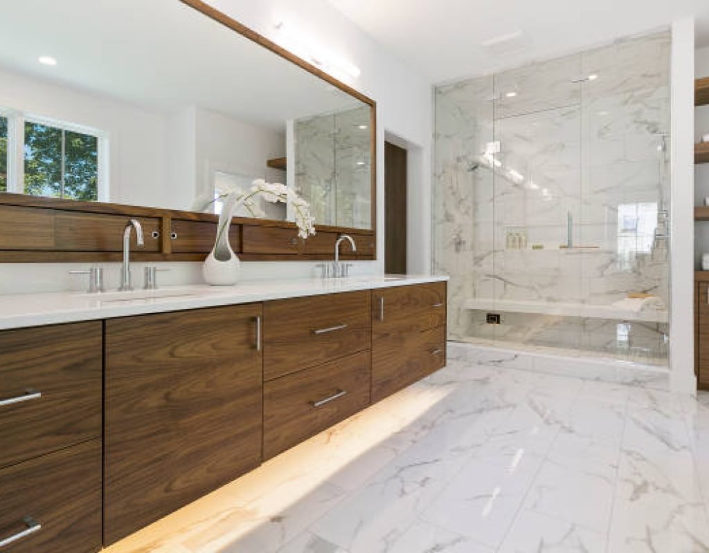 Custom bathroom renovation with walk in shower and tile design