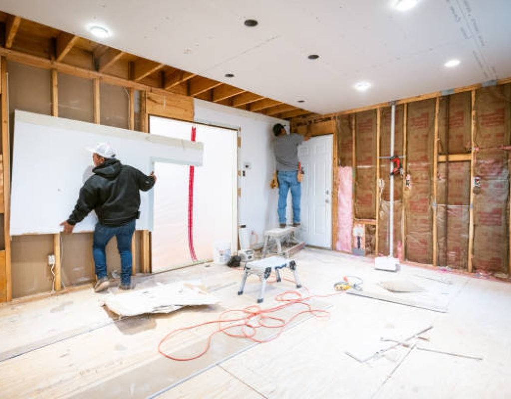 Experienced general contractor overseeing residential construction project